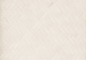 Brown Mat Traditional handicraft bamboo weave texture background. Wicker surface pattern material for wall with antique cracking furniture painted weathered white vintage peeling wallpaper or board.