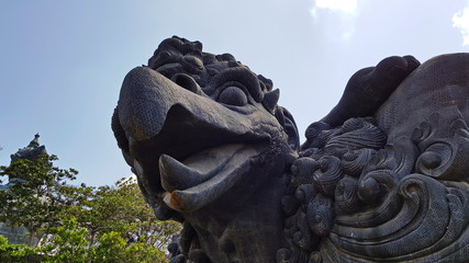 Mythical being statue of Garuda in Garuda Wisnu Kencana cultural park. 