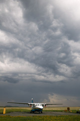 Storm clouds over the airfield in the countryside.