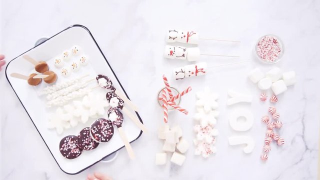 Flat lay. Hot chocolate station with variety of toppings.