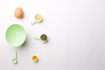 Ingredients for homemade face mask or hair. Castor oil, essential oils, mustard, dry nettle leaves.