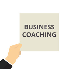 Writing note showing Business Coaching.