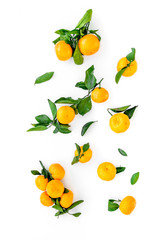 Winter fruits for New Year and Christmas. Tangerines on white background top view