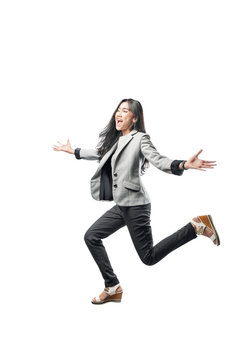 Happy asian business woman running to the finish line with open palm hand