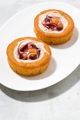 Naklejka na ściany i meble sweet cakes with cream and jam, vertical