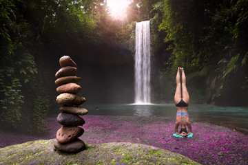 Relaxation restorative yoga in heavenly waterfall location for mind, body, wellness