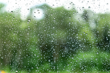 Rain drop on the glass a windows. as background