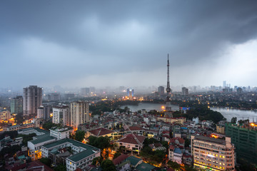 Aerial skyline view of Hanoi city, Vietnam. Hanoi cityscape by sunset period at Hai Ba Trung district viewing from Ba Trieu street