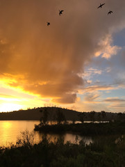 God Beam Rays in the sunset at Lake Murray California