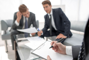 background image. business people working with documents in the office