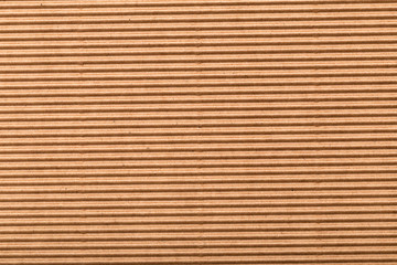corrugated cardboard for packing. abstract background horizontal lines with wavy lines of beige color