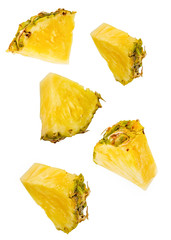 pineapple slices flying isolated on white with clipping path