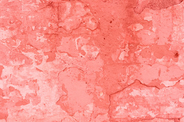 Fototapeta premium Texture, wall, concrete, living coral. It can be used as a background . Wall fragment with scratches and cracks