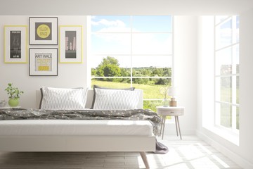 White bedroom with summer landscape in window. Scandinavian interior design. 3D illustration