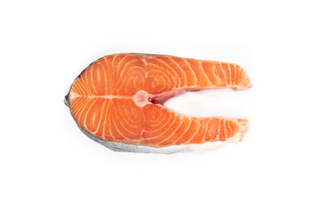 Raw steak of a red fish salmon isolated on white background.