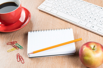 Stationery stuff on wooden table from top view as back to school idea