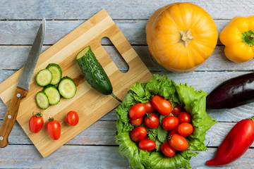 raw vegetables on gray table, top view