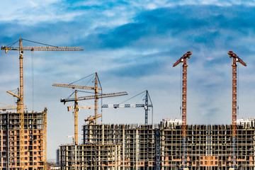 	Construction of new residential buildings against the sky . The concept of the construction...