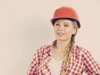 Happy woman in protective helmet
