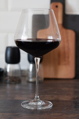 a glass of wine on the table.