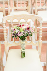 Happy bridal bouquet with pink and white tones for wedding day
