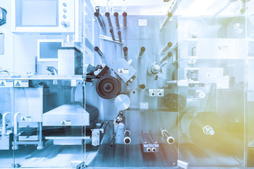 steel chrome machines with shafts. Blue tone. Blue tint