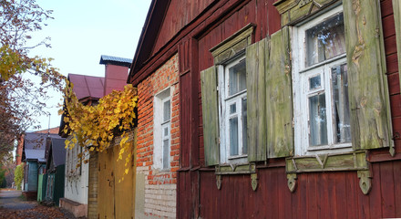 Street with old wooden houses in Russia