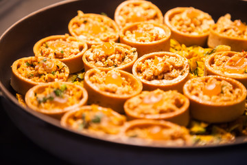 hotel restaurant food catering service buffet or cocktail banquet for wedding receptions, seminars, meetings, conferences, parties or events. Freshly baked appetizers, starters and canapes concept