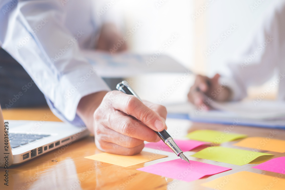 Poster business team data analyzing income charts document during discussion explain strategy meeting. on s