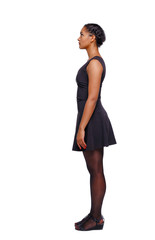 Side view of an African-American woman in a brown dress.