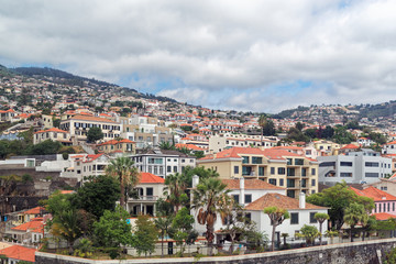 Panoramic view at buildings in Funchal city on Portuguese island of Madeira
