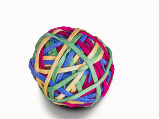 ball of rubber bands, white background