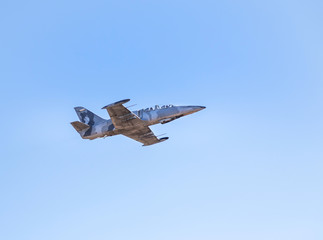 fighter jet military aircraft flying with high speed  on blue sky 