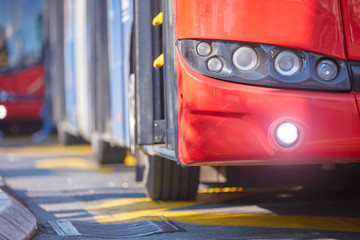 Public transportation / bus in urban surroundings on a station.