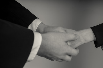 a hand shake in a team