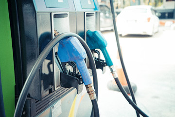 Fototapeta na wymiar Oil dispenser gas station or Car refueling at the petrol station