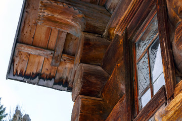 fragment of the wooden masonry of an old building