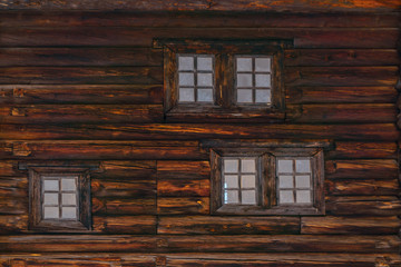 Obraz na płótnie Canvas background - wall of an old log building