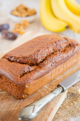 Homemade banana bread on a rustic table