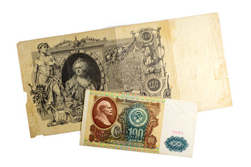  Paper banknotes of 100 rubles of Tsarist Russia and 100 rubles of the Soviet Union on a white background