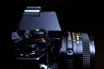 Fototapeta na wymiar Shutterspeed dial, shutter button and film advance crank of a film camera