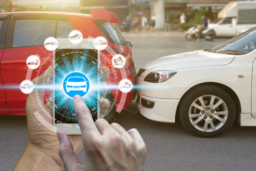 Hand use smartphone with car claim icons over the Network connection on car crash background, car accident for car insuranc claim concept