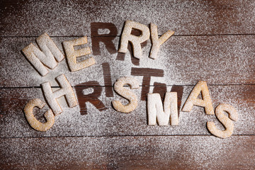 The inscription "merry Christmas" - cookies in the form of letters from ginger dough. Ginger cookies, new year's concert . Manual work.