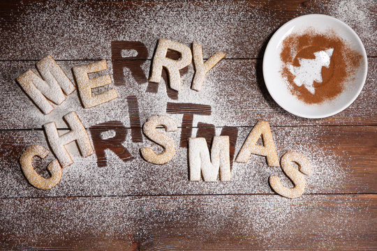 The inscription "merry Christmas" - cookies in the form of letters from ginger dough. Ginger cookies, new year's concert . Manual work. - Powered by Adobe