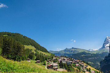 Fototapeta na wymiar Murren Village in Alps mountains. Switzerland. Postcard from Switzerland