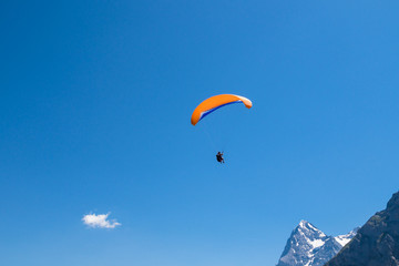 Fototapeta na wymiar Landscape with paragliders in Alps, Switzerland. Murren, Lauterbrunnen, Swiss.