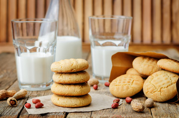peanut butter cookies with glasses of milk