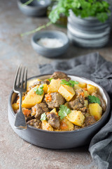 Irish stew made with beef, potatoes, carrots and herbs. Traditional St.Patrick's Day dish.