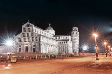 Piazza dei miracoli and The leaning tower by night. Travel in Italy and Pisa concept