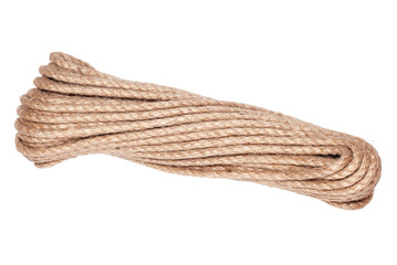 Closeup of rough brown braided coil of rope. Concept equipment, strength, sport, fitness, exercise,...